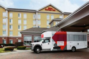 A free shuttle outside the the Hilton Garden Inn Chicago Midway Airport.